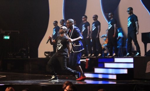 Tinie Tempah and Labrinth perform on stage during the 2011 Brit Awards at the O2 Arena, London.