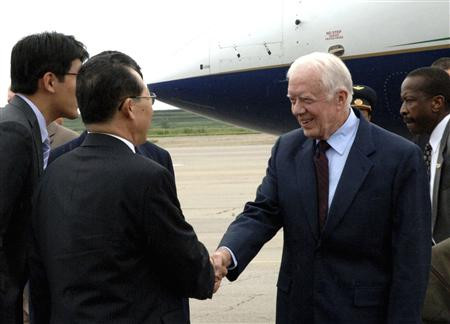 Former U.S. President Jimmy Carter shakes hands with Kim Kye-gwan, Vice Foreign Minister of North Korea, upon his arrival at Sunan airport in Pyongyang Former U.S. President Jimmy Carter shakes hands with Kim Kye-gwan, Vice Foreign Minister of North Korea, upon his arrival at Sunan airport in Pyongyang