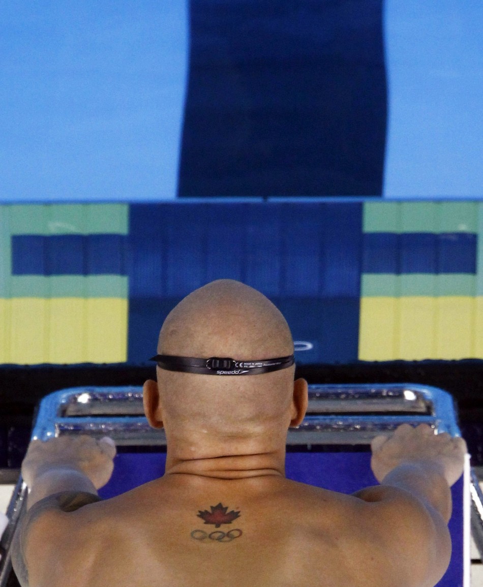 Tattoo of maple leaf and Olympic rings is seen on back of Canada039s Hayden as he competes in men039s 100m freestyle heats at 14th FINA World Championships in Shanghai