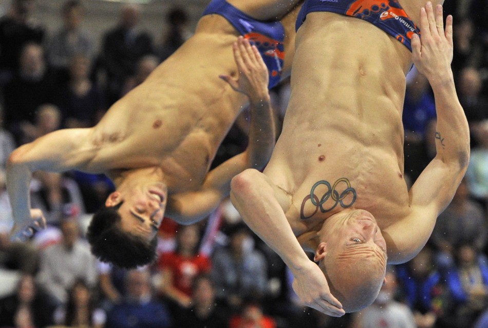 Mears and Robinson Baker of Britain dive during the Men039s Synchronised 3m Springboard preliminary round at the FINA Diving World Cup in London