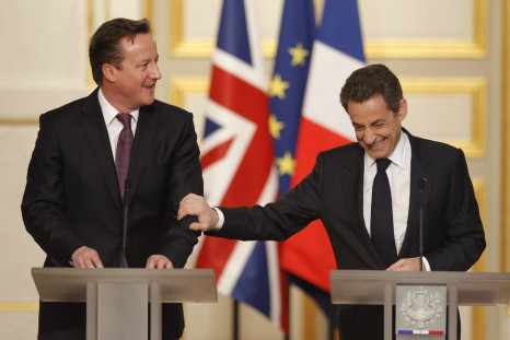 France's President Sarkozy and Britain's Prime Minister Cameron attend a news conference during a Franco-British summit at the Elysee Palace in Paris
