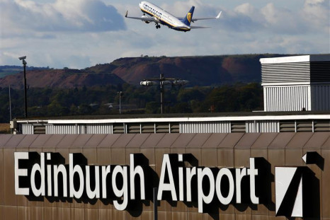 An passenger jet takes off from Edinburgh Airport in Scotland