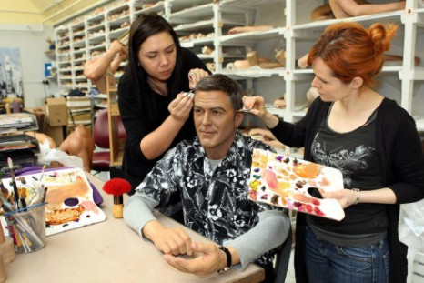 The Madame Tussauds' George Clooney wax figure being 'spruced up' ahead of the Oscars, Madame Tussauds, London.