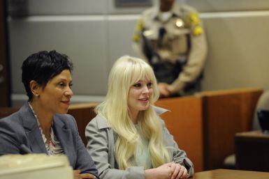 Actress Lindsay Lohan and her attorney Shawn Chapman Holley attend a progress report hearing on her probation at the Airport Branch Courthouse in Los Angeles