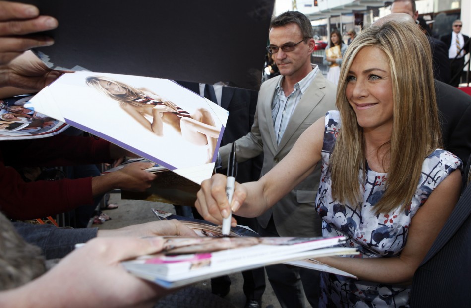 Actress Jennifer Aniston signs autographs