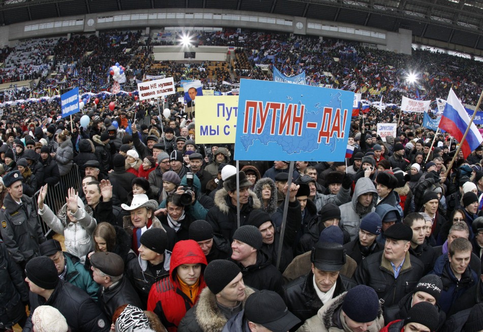 People take part in rally for Putin