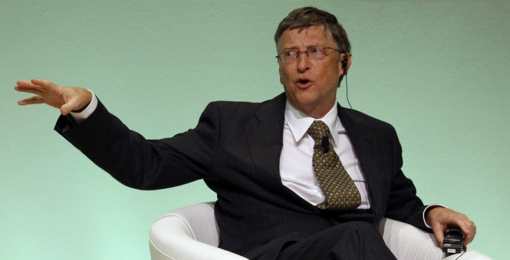 Bill Gates gestures as he speaks during an IFAD Annual Governing Council in Rome