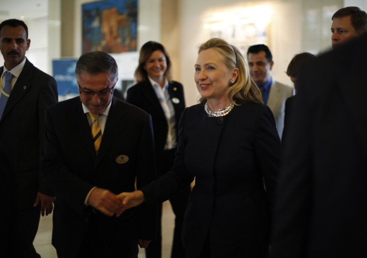U.S. Secretary of State Hillary Clinton arrives at her hotel in Tunis
