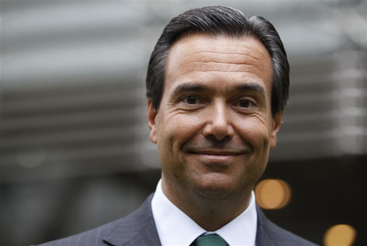 Lloyds Banking Group CEO Antonio Horta-Osorio poses outside the bank&#039;s headquarters on his first day back at work after taking a leave of absence due to exhaustion, in the City of London