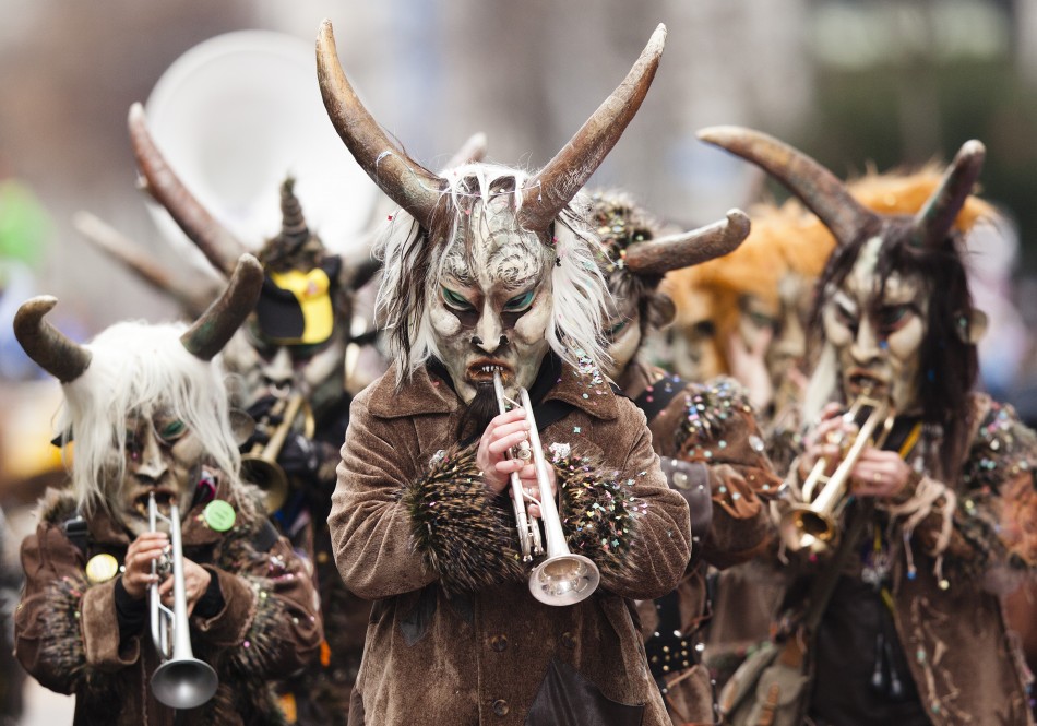Musicians dressed for carnival perform at the Luzern-Carnival