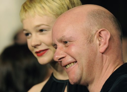 British writer Nick Hornby, right, an Academy Award nominee for Best Adapted Screenplay for quotAn Education,quot poses with cast member Carey Mulligan, an Academy Award nominee for Best Actress