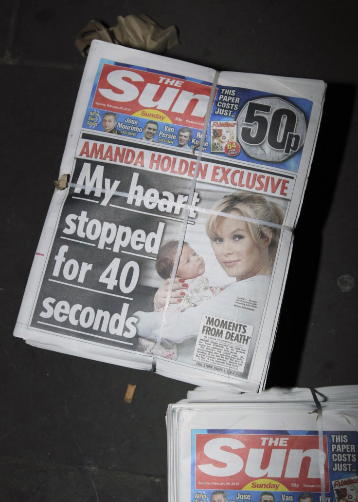 Copies of the first edition of the &quot;Sun on Sunday&quot; are seen for sale at Charring Cross station in London