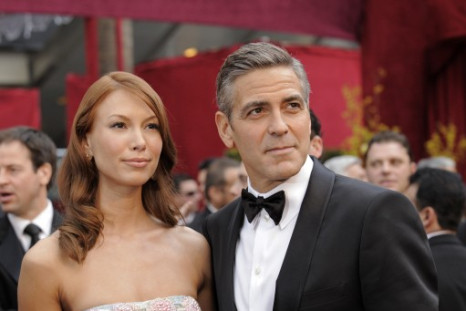 George Clooney arrives with his girlfriend Sarah Larson