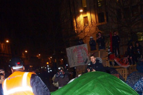 Corporation of London workers remove tents and other structures from the square in front of St Paul&#039;s Cathedral, where anti-capitalist protesters have been camped since November.