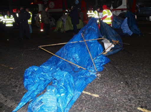 Corporation of London workers remove tents and other structures from the square in front of St Paul039s Cathedral, where anti-capitalist protesters have been camped since November.