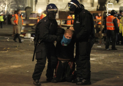 A protester is detained by the riot police after being removed by bailiffs from the last remaining structure of the Occupy encampment outside St Paul039s Cathedral in London A protester is detained by the riot police after being removed by bailiffs from the last remaining structure of the Occupy encampment outside St Paul039s Cathedral in London
