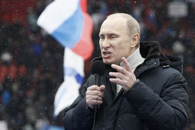 Russian Prime Minister Vladimir Putin delivers speech in Moscow in run-up to presidential election