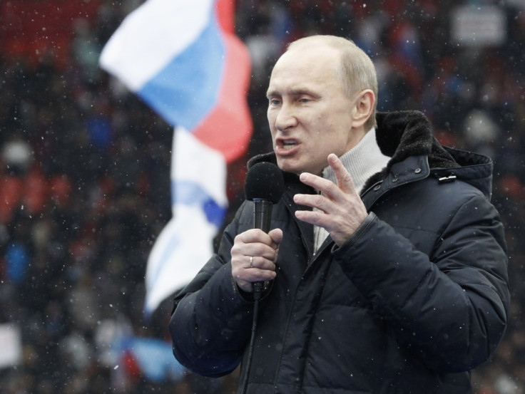 Russian Prime Minister Vladimir Putin delivers speech in Moscow in run-up to presidential election