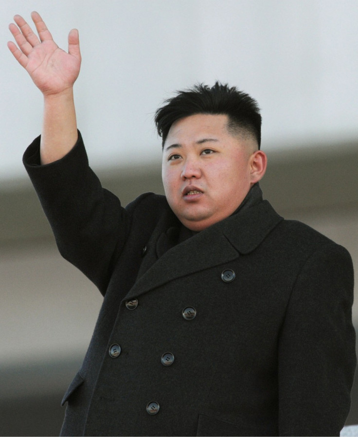 North Korean leader Kim Jong-Un waves during a military parade in Pyongyang