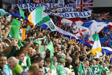 Celtic fans cheer in stands during Old Firm derby