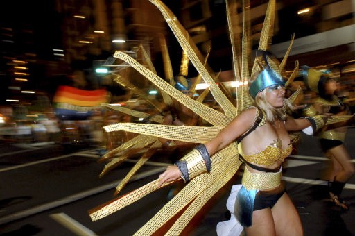 Participants perform during the 33rd Sydney Gay and Lesbian Mardi Gras Parade in Sydney, Australia, Saturday, Feb. 27, 2010. Started in 1978 as a protest march for gay rights, the parade attracts hundreds of thousands of spectators to the city to watch th