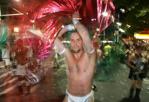 Colorful dancers perform during the annual Gay and Lesbian Mardi Gras Parade in Sydney, Australia, Saturday, March 4, 2006