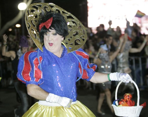 A man dressed as Snow White parades during the 30th anniversary of Sydney Gay and Lesbian Mardi Gras in Sydney, Australia, Saturday, March 1, 2008.