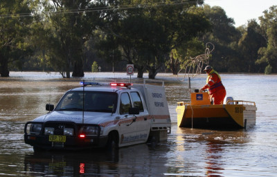 Rainfall poured down by ex-tropical cyclone Oswald has brought flowing to the eastern state of Queensland, Australia, where so far 20 have been rescued.