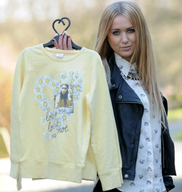 Fashion student Nicola Kirkbride with jumper from Tesco that features her photo