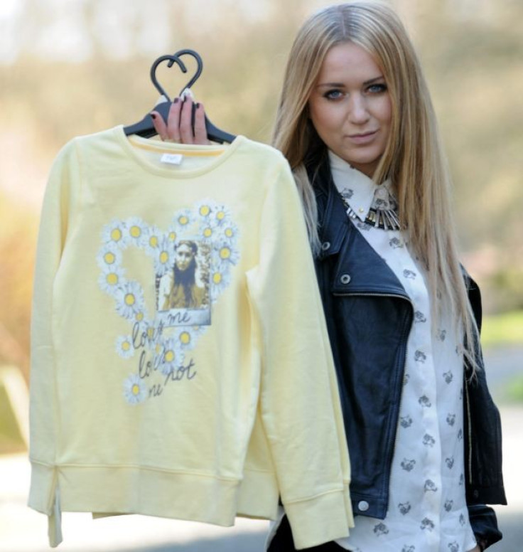 Fashion student Nicola Kirkbride with jumper from Tesco that features her photo