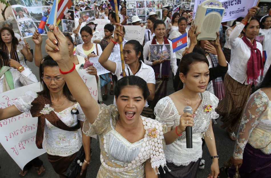 Cambodian woman shouts slogans while marching to mark International Womens Day in central Phnom Penh