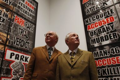 Artists Gilbert & George pose in front of their new exhibition &quot;London Pictures&quot; at a White Cube gallery in London