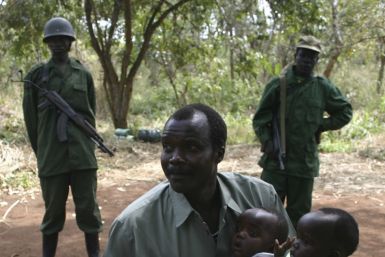 LRA leader Kony poses with daughter and son at peace negotiations in Ri-Kwangba