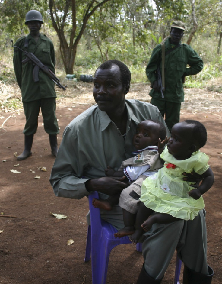 LRA leader Kony poses with daughter and son at peace negotiations in Ri-Kwangba