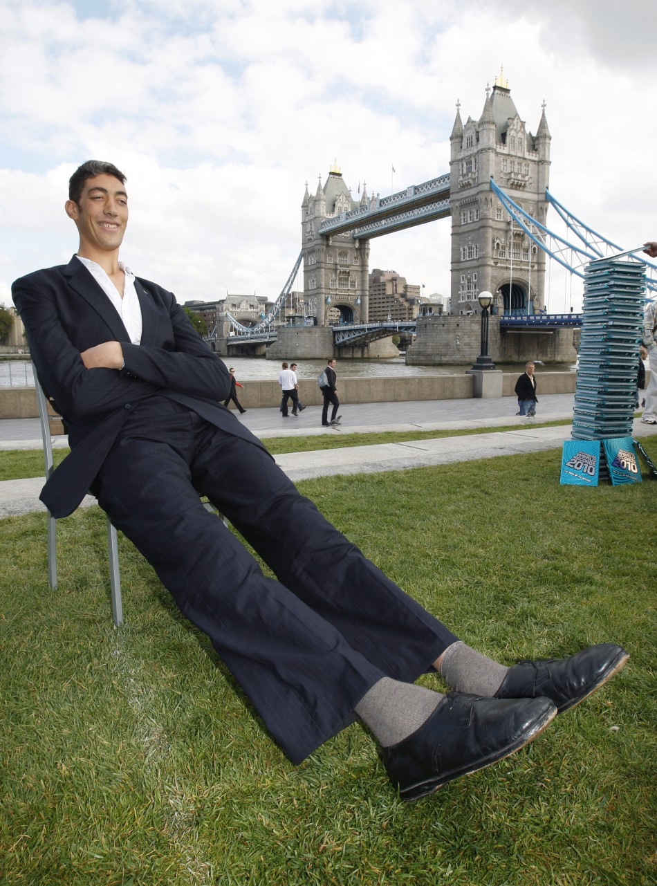 World's Tallest Man Stops Growing [ PHOTOS]