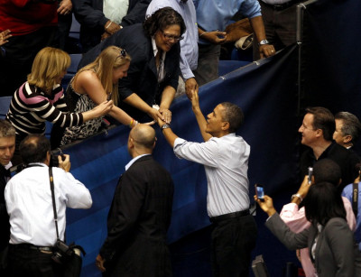 U.S. President Barack Obama greets supporters as he arrives with British PM David Cameron U.S. President Barack Obama greets supporters as he arrives with British PM David Cameron