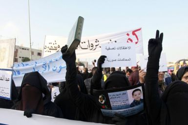 Veiled women take part in a demonstration called by the &quot;February 20 Movement&quot; demonstration organized by the February 20 Movement