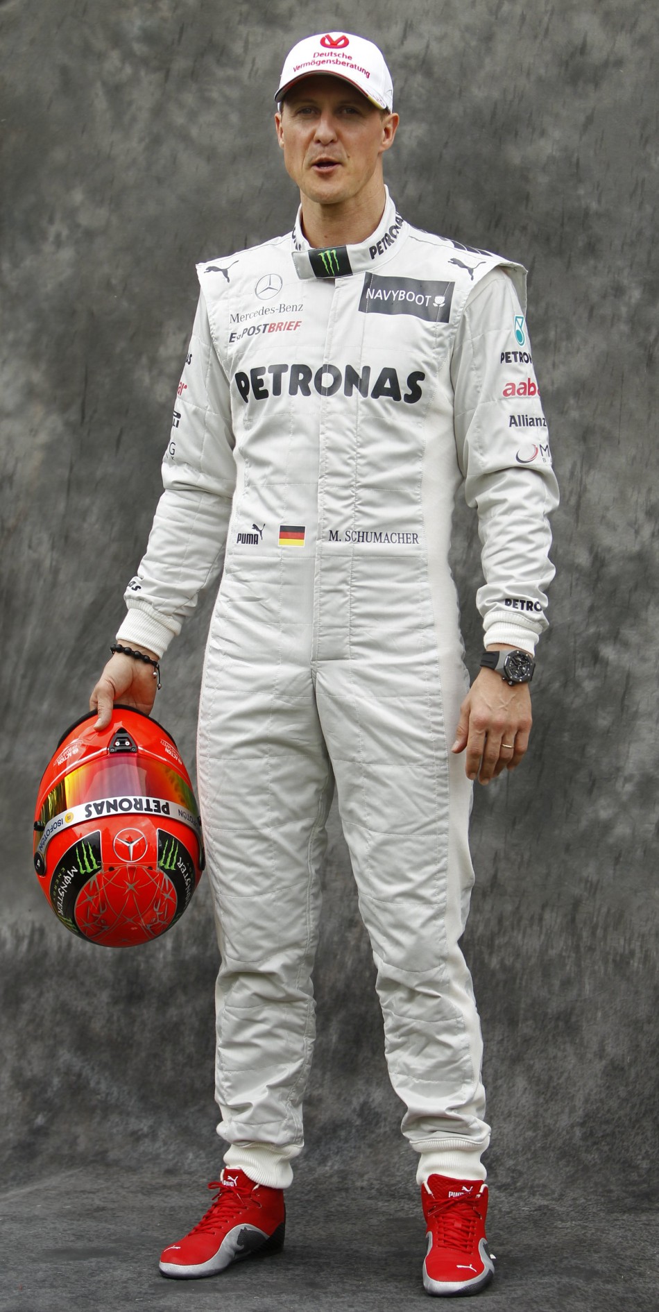 Mercedes Formula One driver Schumacher poses prior to the Australian F1 Grand Prix at the Albert Park circuit in Melbourne