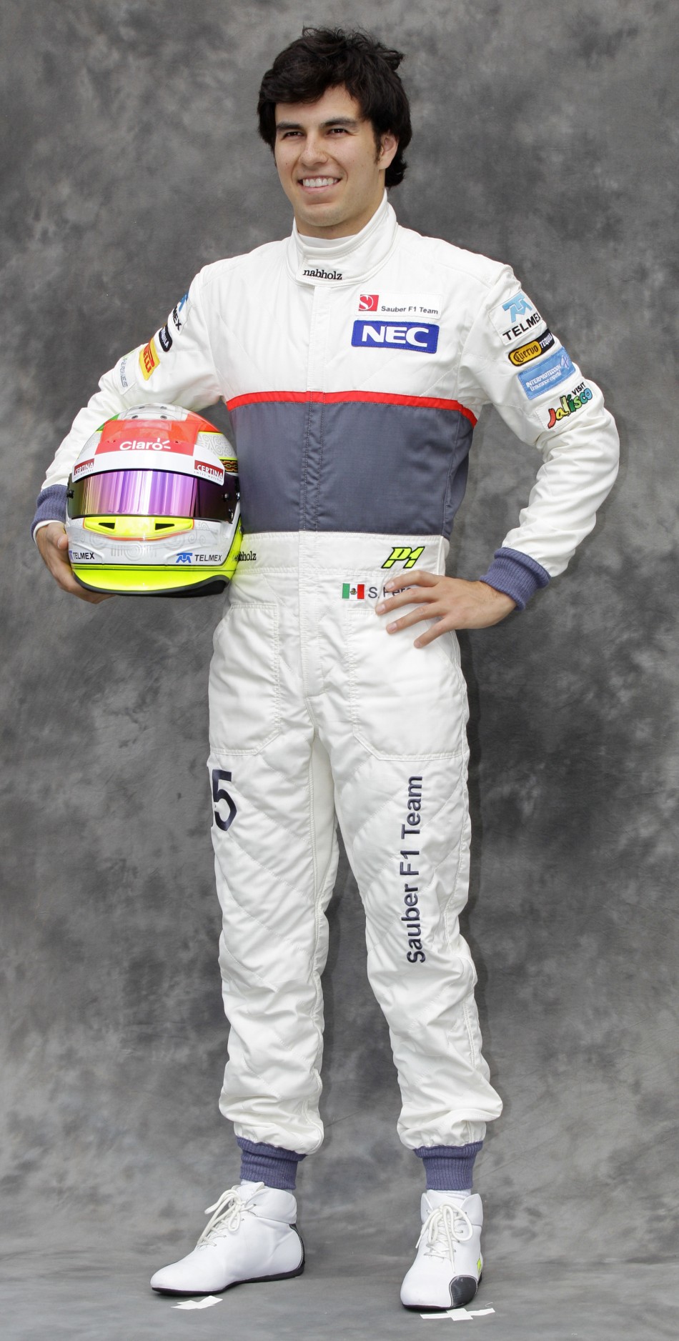 Sauber Formula One driver Perez poses prior to the Australian F1 Grand Prix at the Albert Park circuit in Melbourne