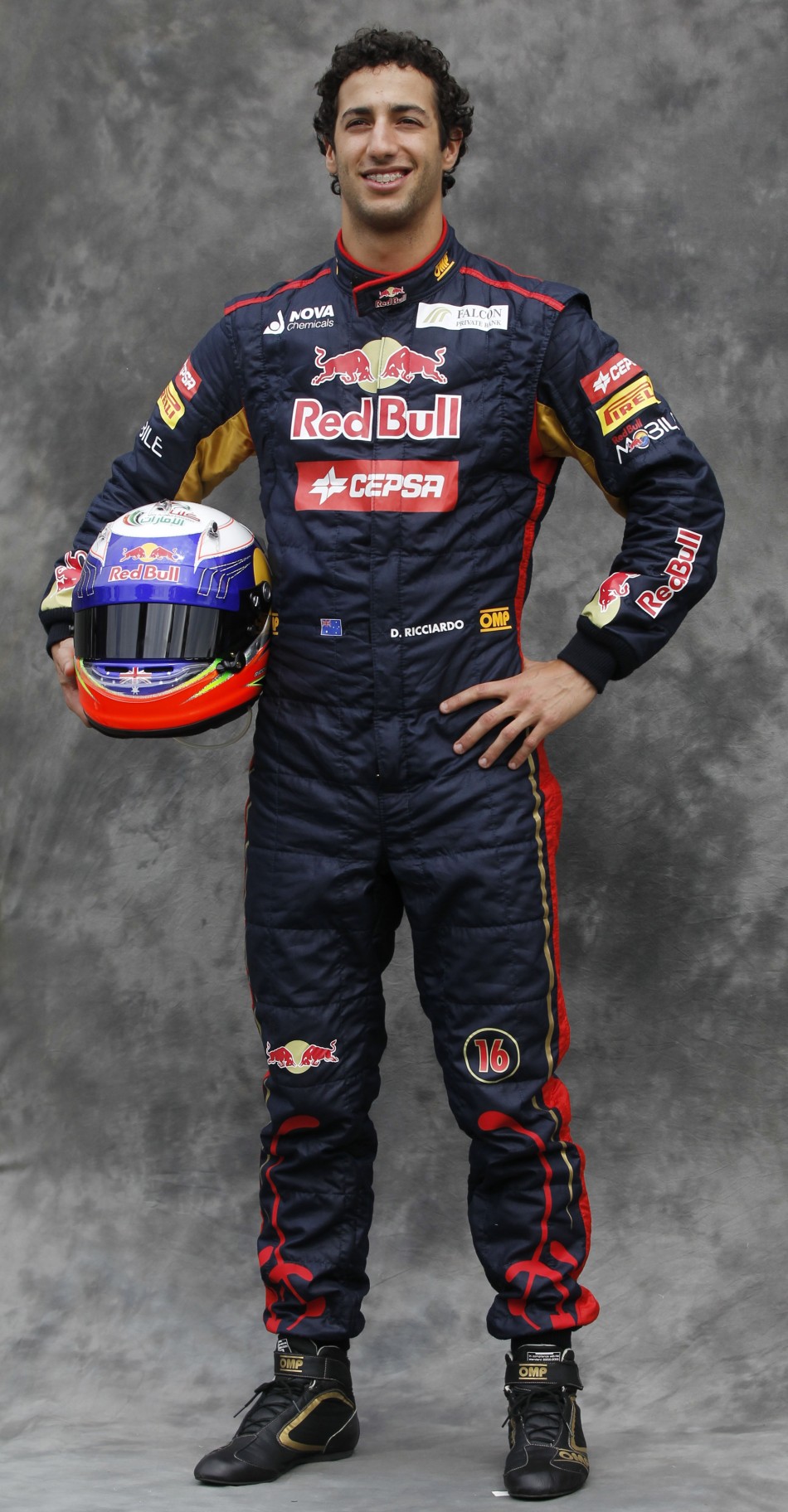 Toro Rosso Formula One driver Ricciardo poses prior to the Australian F1 Grand Prix at the Albert Park circuit in Melbourne
