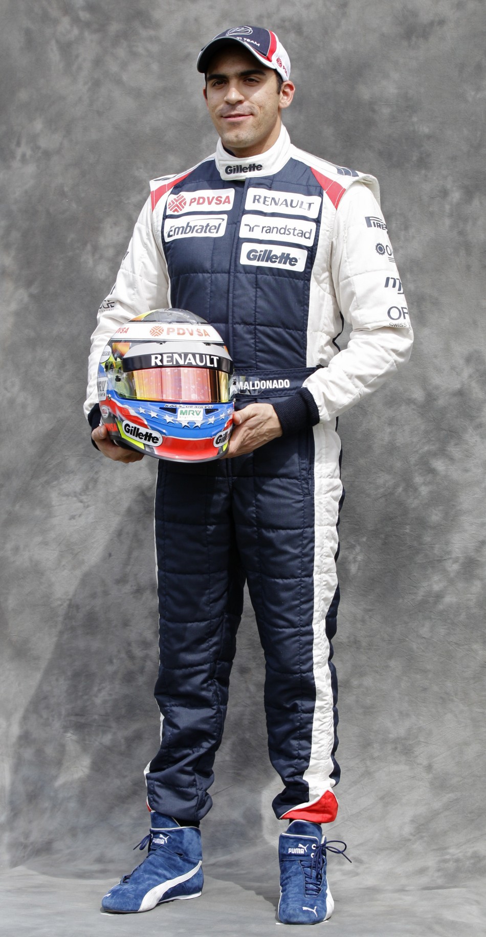 Williams Formula One driver Maldonado poses prior to the Australian F1 Grand Prix at the Albert Park circuit in Melbourne
