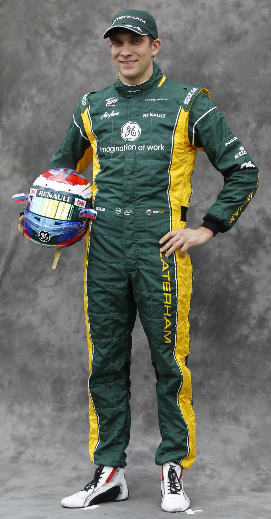 Renault Formula One driver Petrov poses prior to the Australian F1 Grand Prix at the Albert Park circuit in Melbourne
