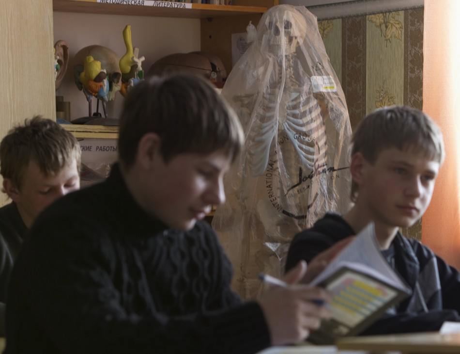 Ninth-grade pupils attend a chemistry lesson at a school based in the remote Russian village of Bolshie Khutora