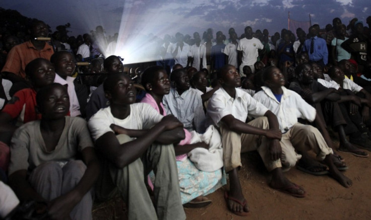 Residents watch the premiere of &quot;Kony 2012&quot; in Lira district