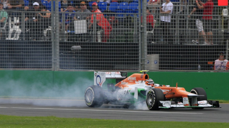 Force India Formula One driver Hulkenberg locks his brakes during the first practice session of the Australian F1 Grand Prix at the Albert Park circuit in Melbourne