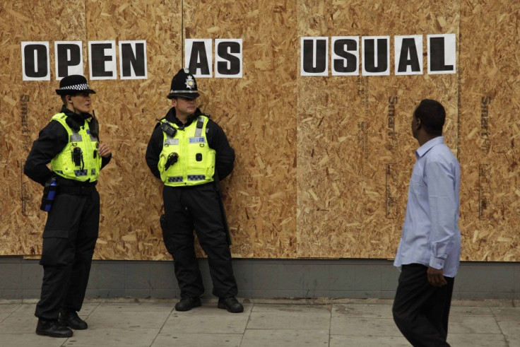 Police officers standing on a watch maintaining law and order