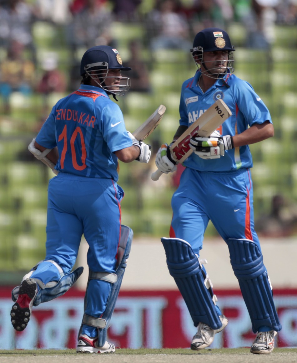 India039s Gautam Gambhir and Sachin Tendulkar run between the wickets against Bangladesh during their One Day International ODI cricket match of Asia Cup in Dhaka.