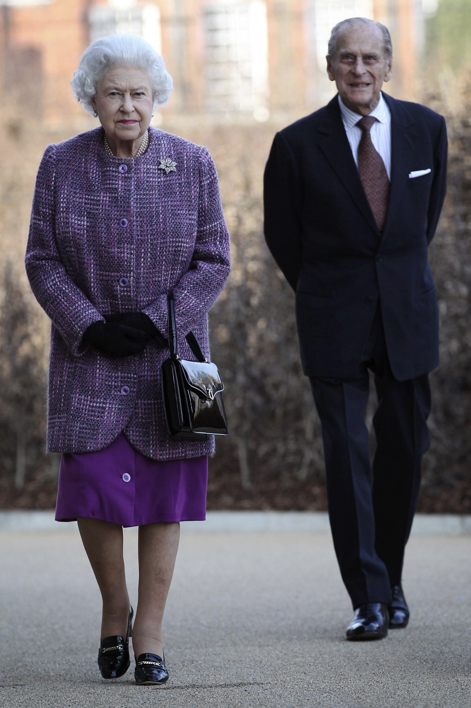 Britain039s Queen Elizabeth and Prince Philip arrive for the official reopening of Kensington Palace in London