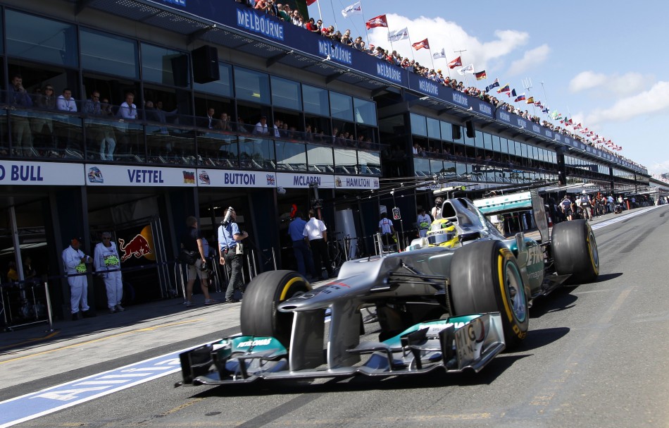 Mercedes Formula One driver Rosberg drives in the pit lane during the third practice session of the Australian F1 Grand Prix at the Albert Park circuit in Melbourne
