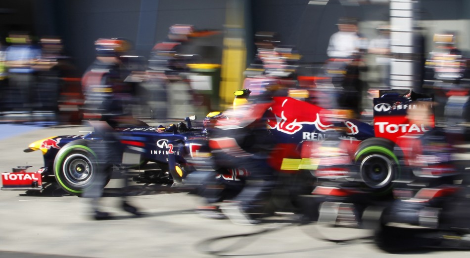 Red Bull Formula One driver Mark Webber of Australia drives out from his pit during the qualifying session of the Australian F1 Grand Prix at the Albert Park circuit in Melbourne
